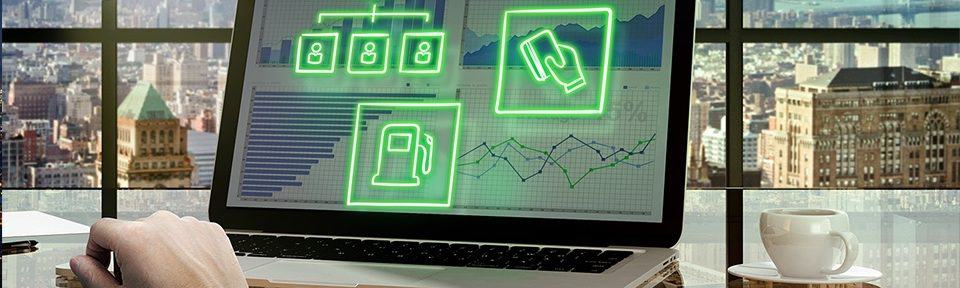 photo of a computer screen with analytics on. Green fuel pumps are drawn on top of the image