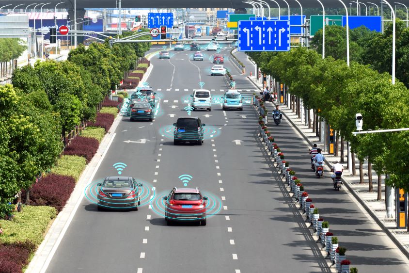 Road of cars with blue graphics to indicate connectivity