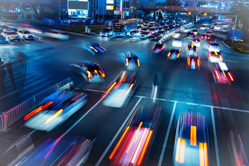 Long exposure image of traffic driving through a city at night