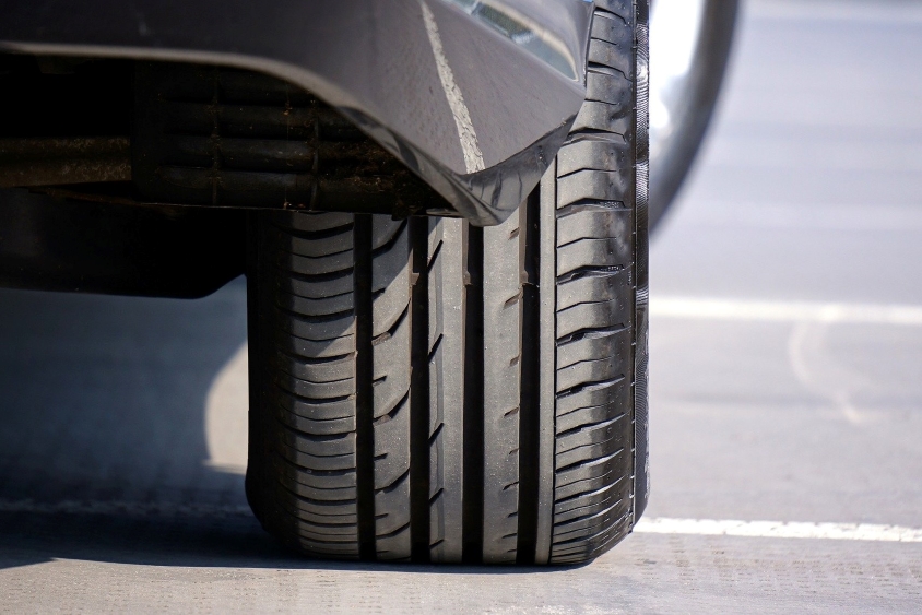 Shot of a tire on the back wheel of a car