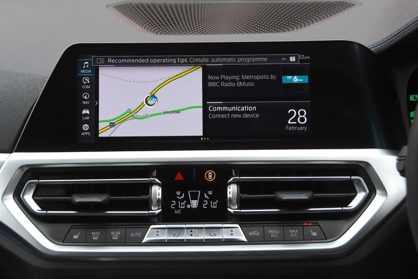 Satnav and entertainment system on car dashboard