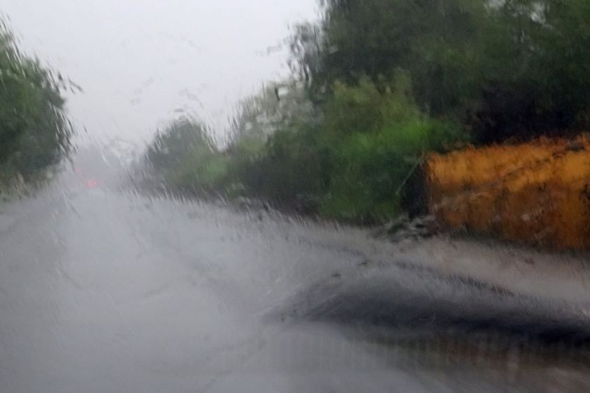 Rain on windscreen from interior of car