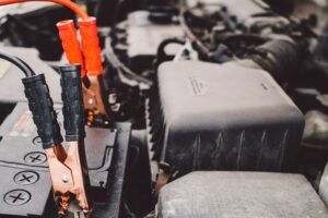 Jump cables attached to car engine