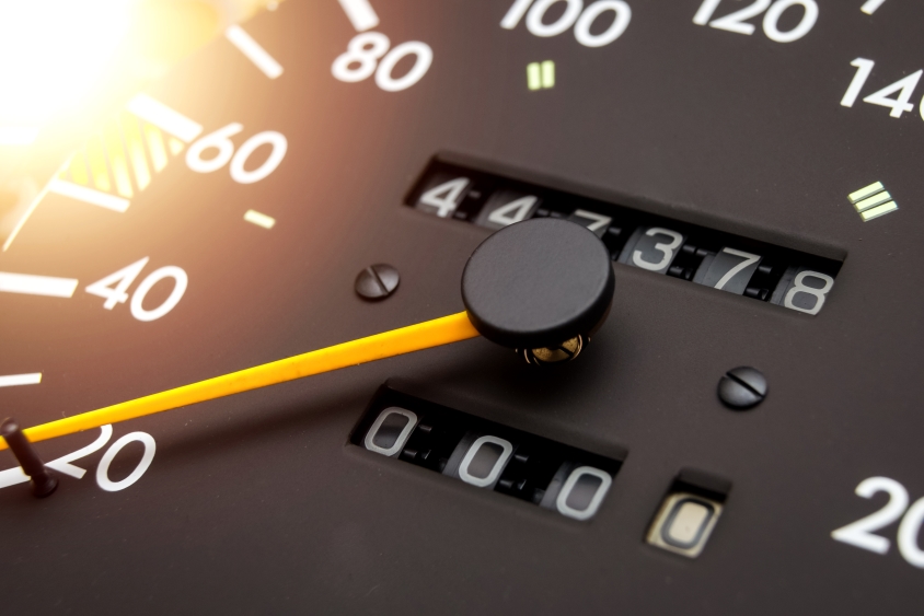 Close up of a car speedometer and odometer