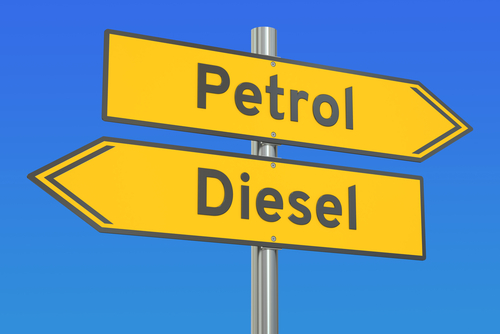 Image of signs reading 'petrol' and 'diesel', pointing in opposite directions