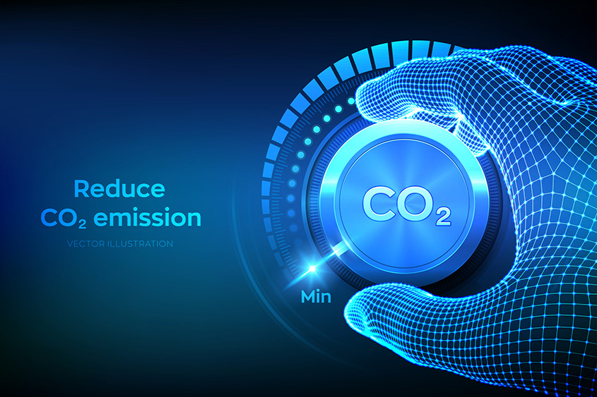 Digital image of hand turning down a dial with CO2 label