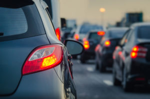 Traffic jam on motorway with stationary cars