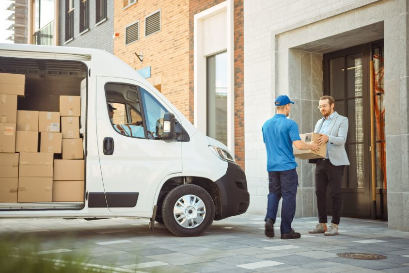 Man delivering package from delivery van