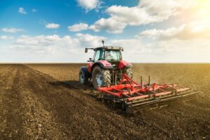 Tractor ploughing field