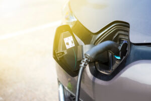 Charger plugged in to electric vehicle