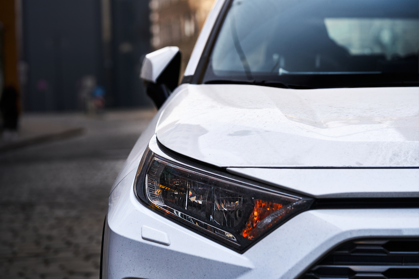 Close up of front of white car