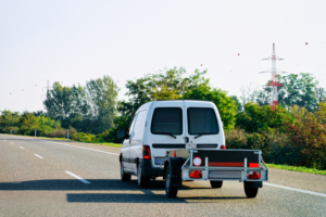 Van towing a trailer 