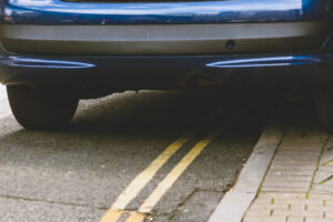 car parked on a double yellow line