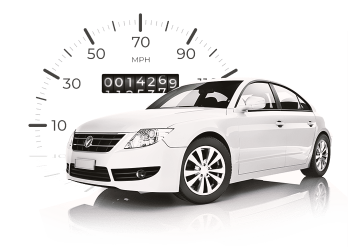 White car in front of speedometer
